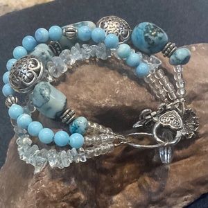 Gorgeous 3 Strand Chunky Turquoise and Silver Plated Round Puffed Bead. 7.5”